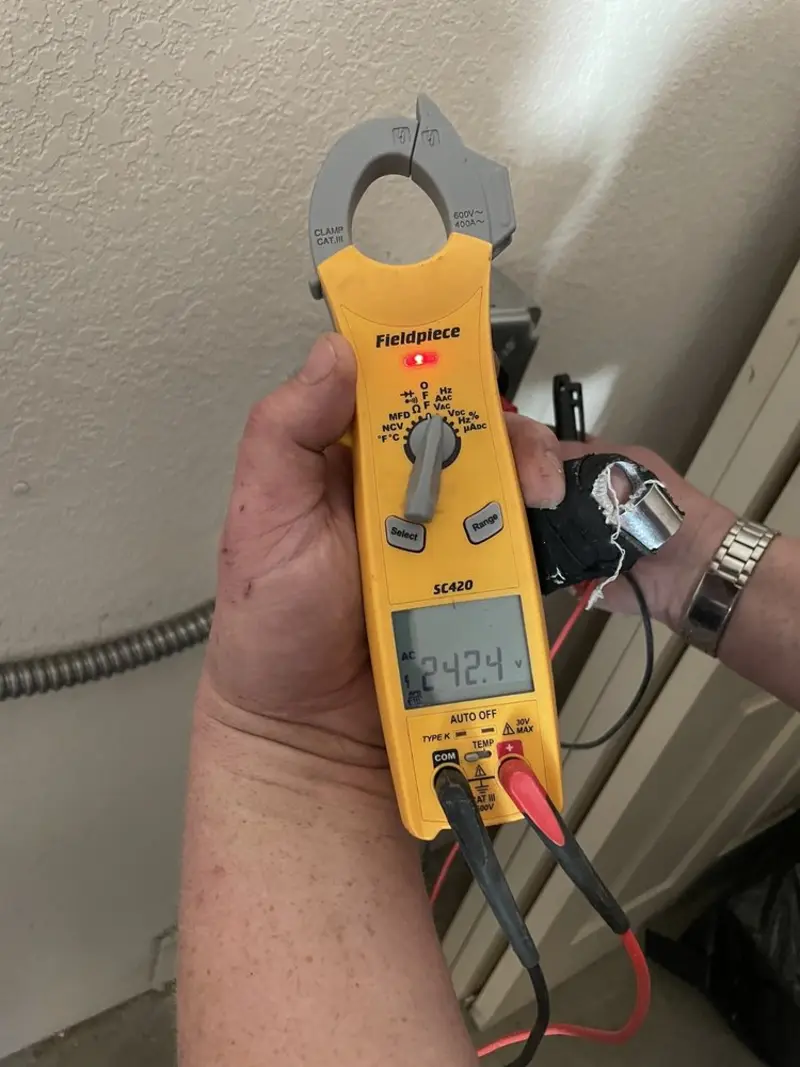 Voltage testing with clamp meter during Generator Installation in West Caln